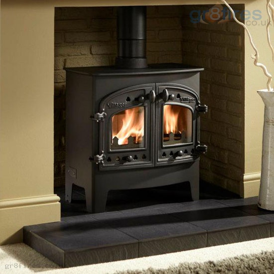 What does the heat output of a woodburning stove mean?
